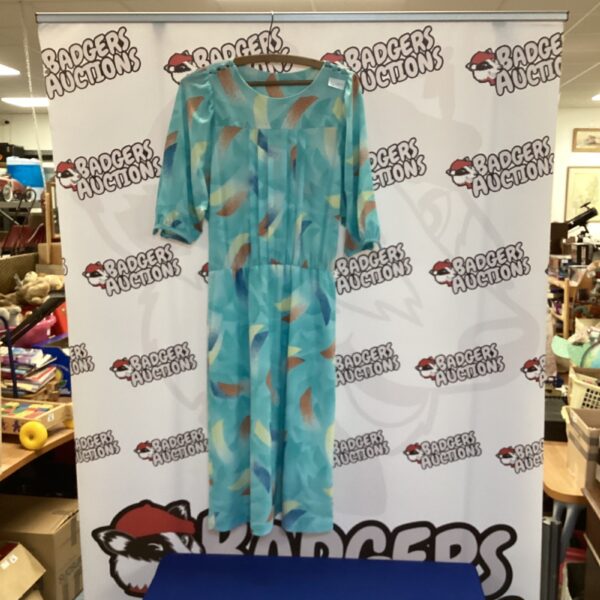 Ladies size 36 summer dress with floral print.