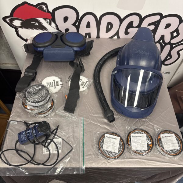 Sundstrom SR500 powered respirator with face shield and accessories.