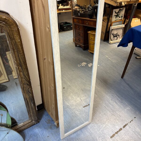 Tall wood effect mirror for hallway or bedroom decor.