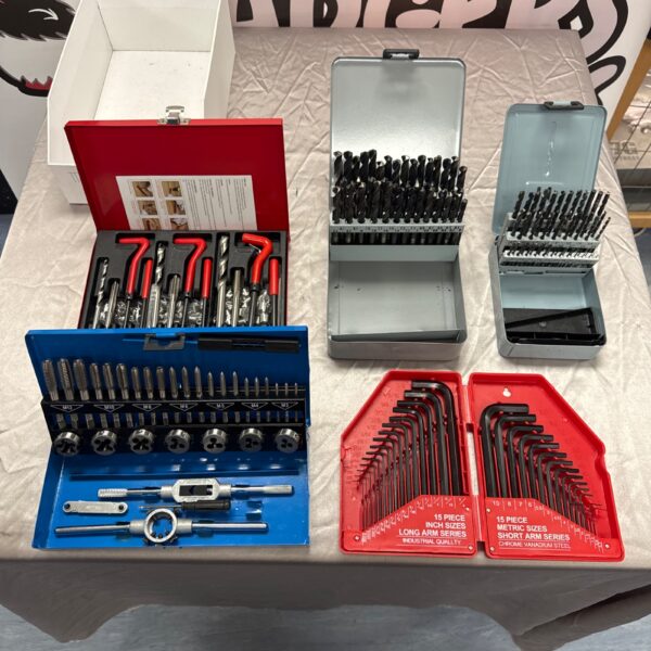 Comprehensive tap and die set with various tools in a case.