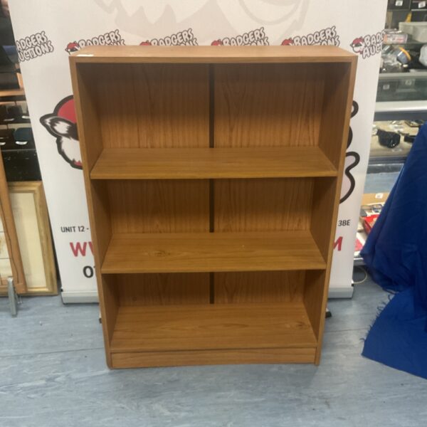 Vintage teak effect bookcase with four shelves.