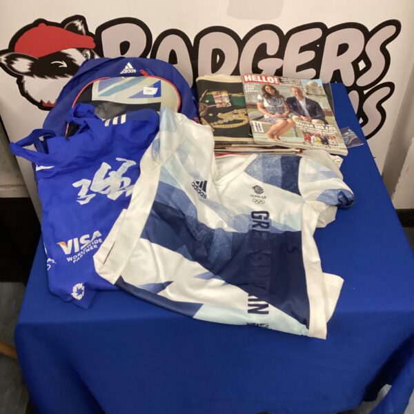 Team GB Adidas Olympic bundle with magazines and newspapers.