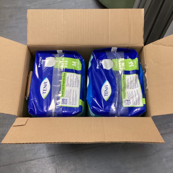 Unopened boxes of Tena Pro Skin Pants in medium size.