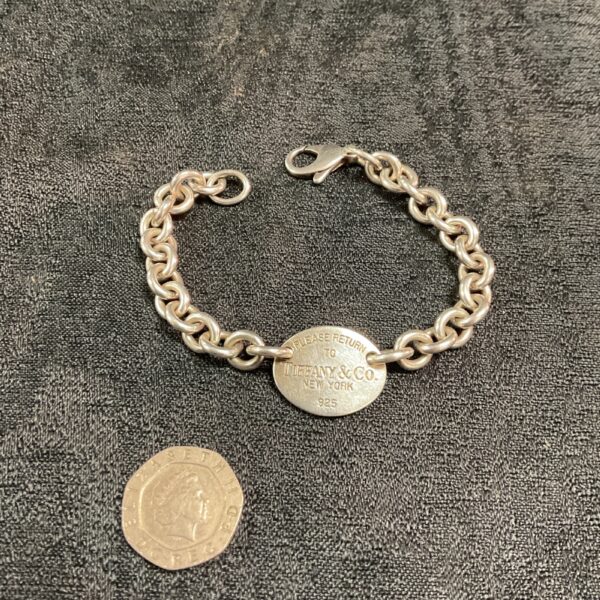 Vintage Tiffany 925 silver bracelet with interlocking links.