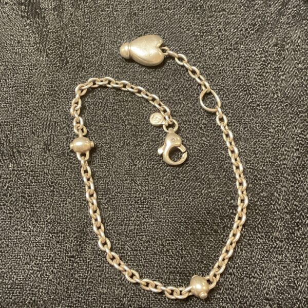 Vintage silver Tiffany heart bracelet with delicate chain.