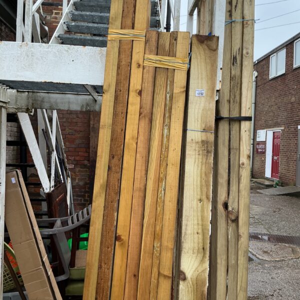 Stacked timber bundles ready for construction or DIY projects.