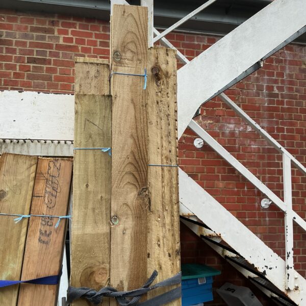 Lot of rough sawn timber planks for construction projects.