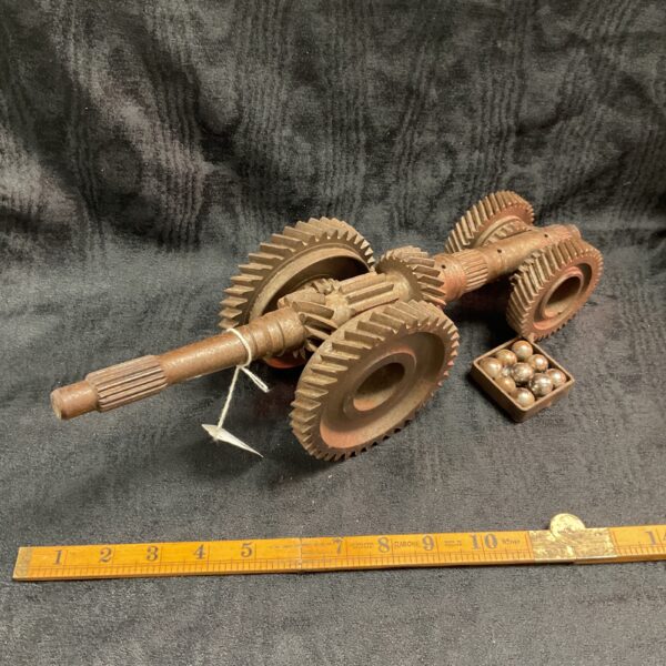 Vintage trench art gearbox cannon, a unique military collectible.