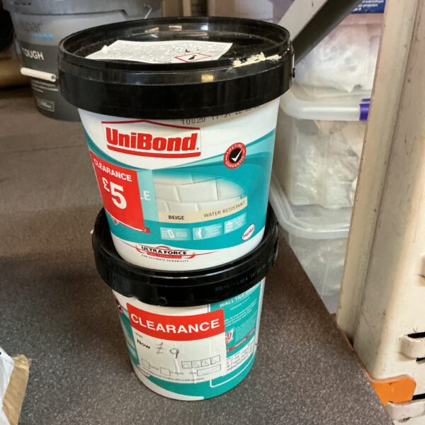 Unibond 5kg tile grout and adhesive container for DIY projects.