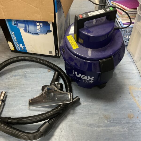 Front view of a Vax pet carpet washer in used condition.