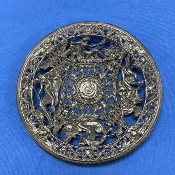 Intricate Victorian Coalbrookdale cast iron plate with classical scenes.