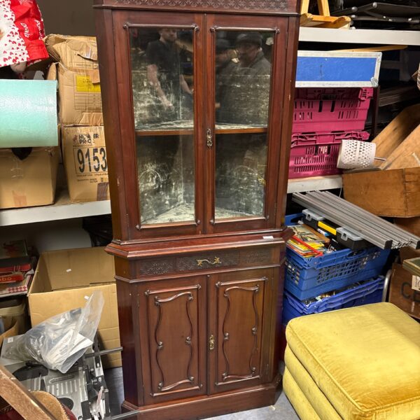 Antique Victorian mahogany display cabinet with glazed doors.