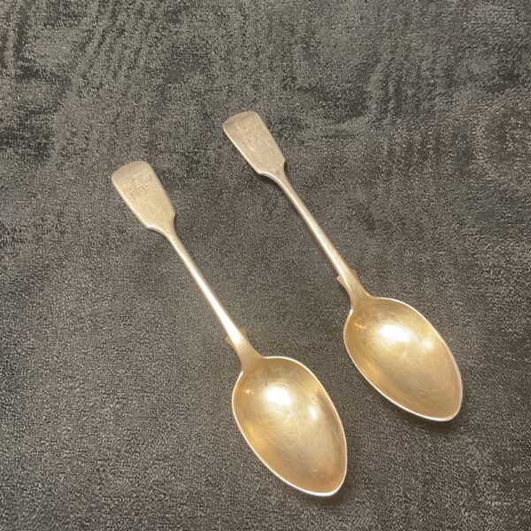 Pair of antique Victorian silver teaspoons, hallmarked sterling silver.