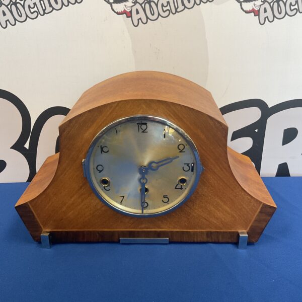 Vintage Art Deco mantle clock with wooden case.