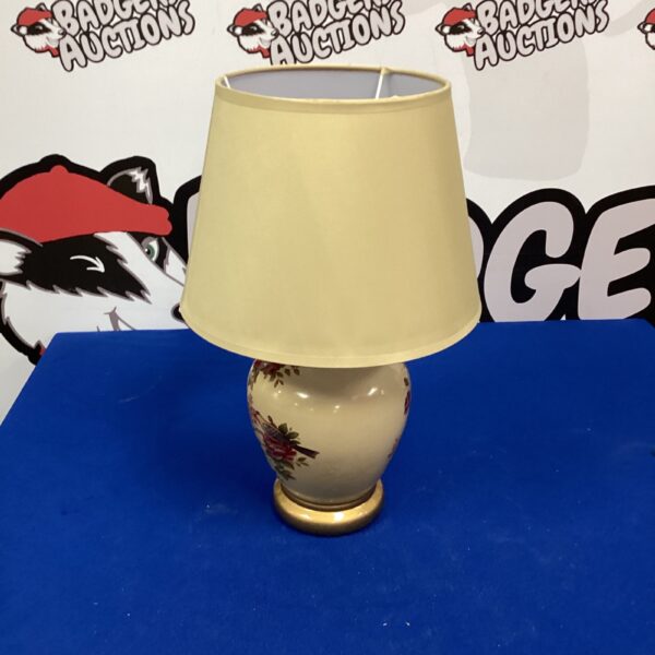 Vintage ceramic table lamp with floral design, battery operated.