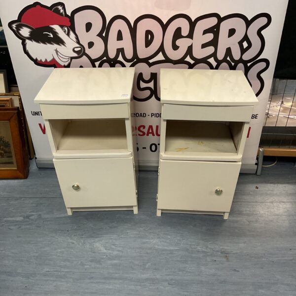 Pair of vintage painted bedside cabinets for bedroom storage.