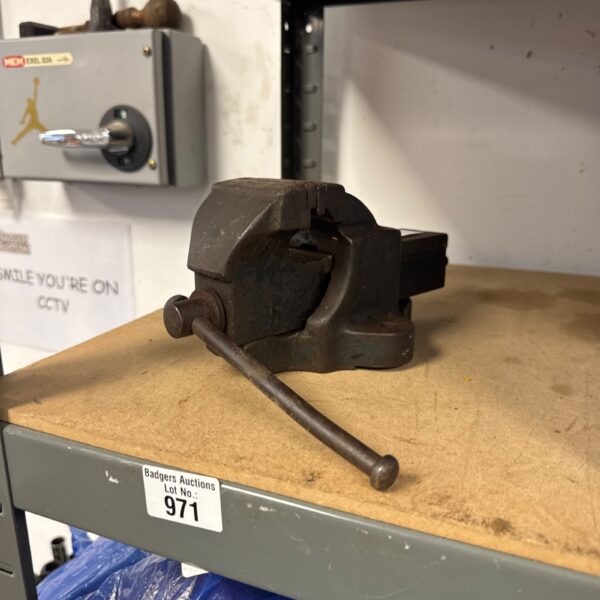 Small vintage wooden bench vice for woodworking and metalworking.