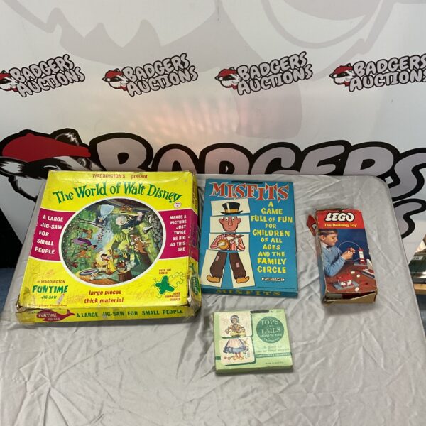 Overview of vintage board game lot including Disney puzzle and Lego.