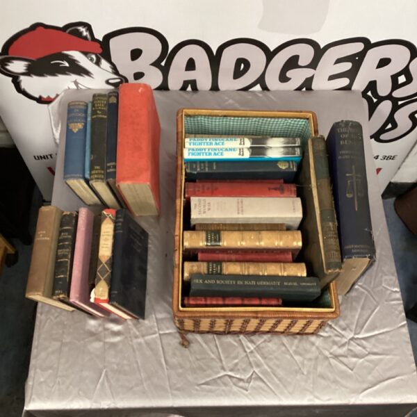 Stack of vintage books including a book on Nazi Germany.