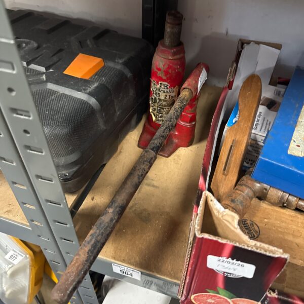 Vintage 2 ton hydraulic bottle jack, side view.