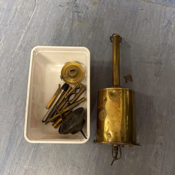 Vintage brass Salter rotisserie with winding mechanism and accessories.