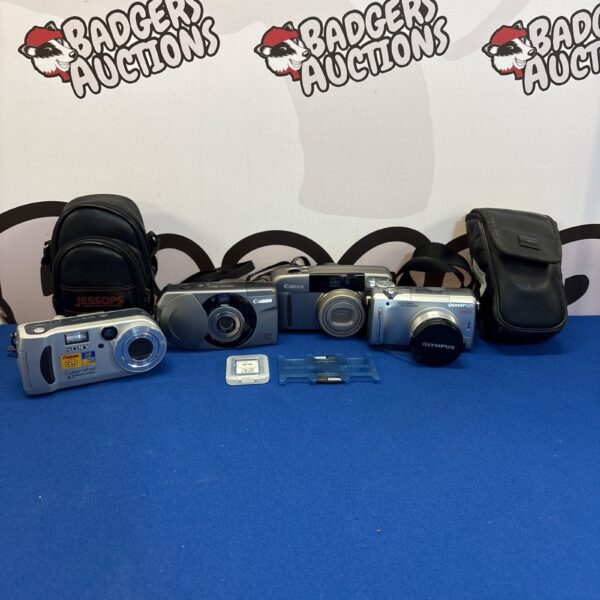 Vintage camera bundle featuring Sony, Canon, and Olympus point and shoot cameras.