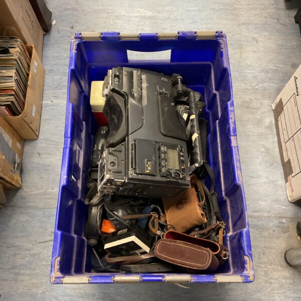 Vintage Hi8 camcorder and film cameras in a mixed lot.