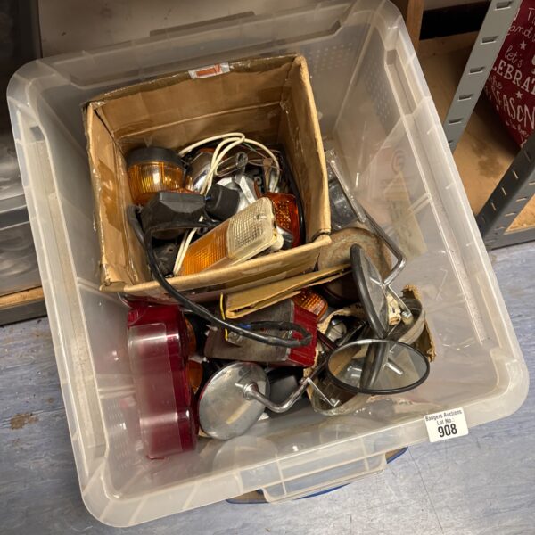 Vintage car and cycle parts lot for restoration or collection.