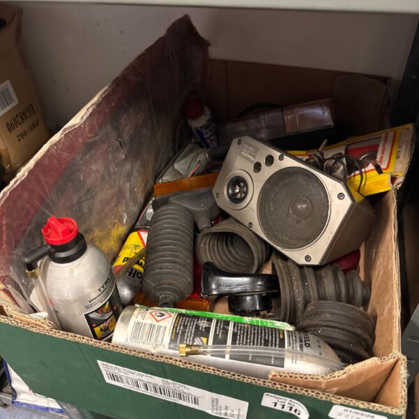 Tray of mixed vintage car parts for classic car restoration.