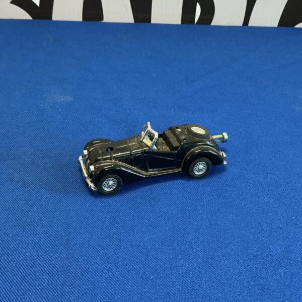 Vintage car table lighter, Art Deco style collectible.
