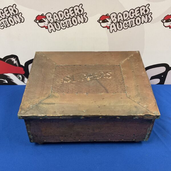 Antique vintage copper slipper box with fabric lining.