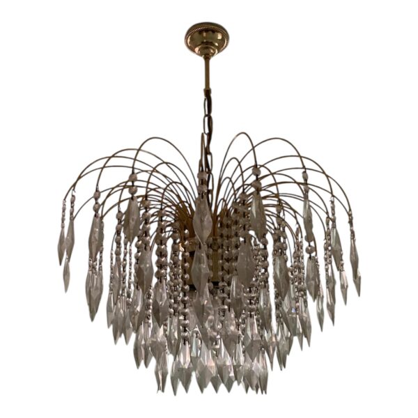 Vintage brass and crystal palm chandelier with cascading strands.
