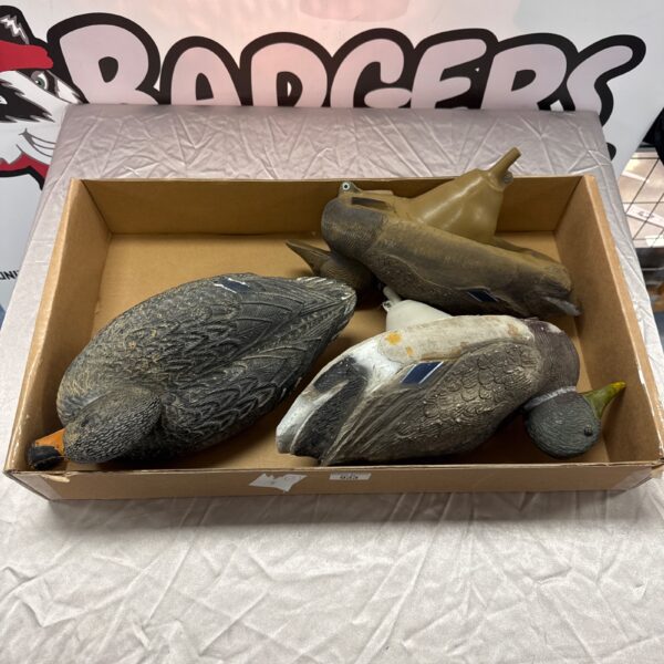 Lot of three vintage duck decoys for hunting or collecting.