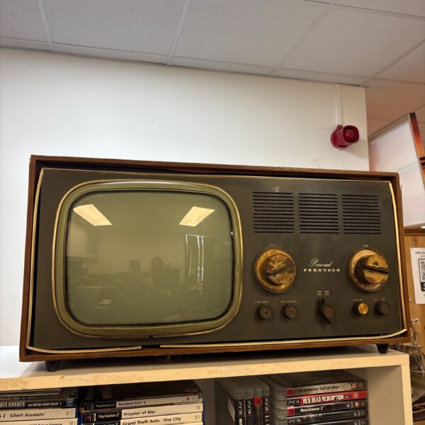 Front view of a vintage Ferguson television in wooden cabinet.