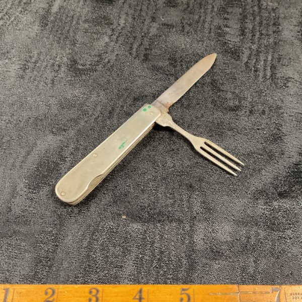 Vintage silver plated folding knife and fork set for camping.