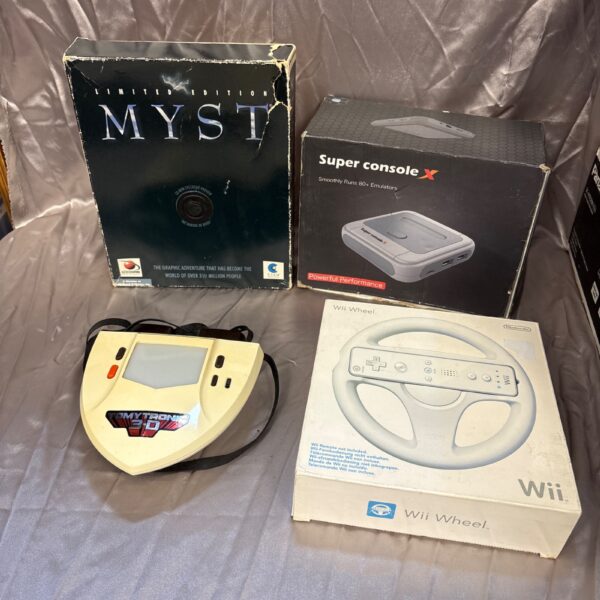 Vintage Super Console X gaming console in a mixed lot.