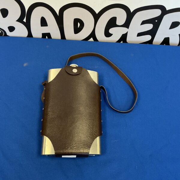 Vintage brown leather hip flask case with steel flask.