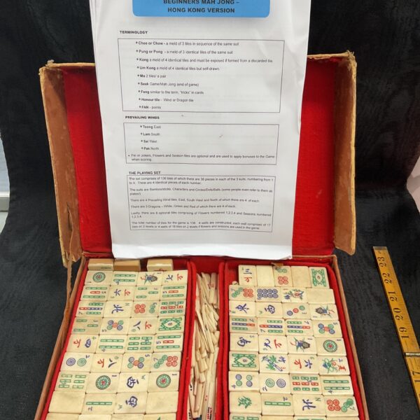 Vintage Hong Kong Mahjong set with tiles and instructions.