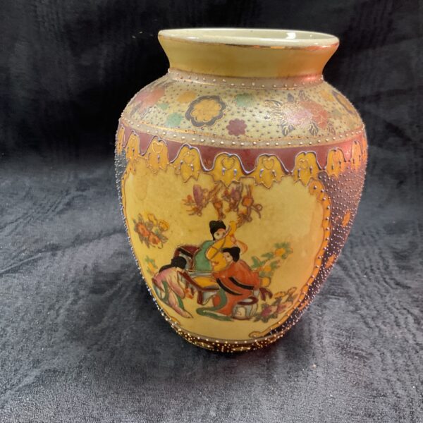 Vintage Japanese Satsuma vase with hand-painted figures and gilt details.