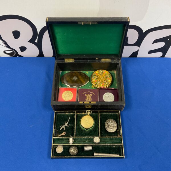 Vintage jewellery box with silver brooch, rings and pocket watch.