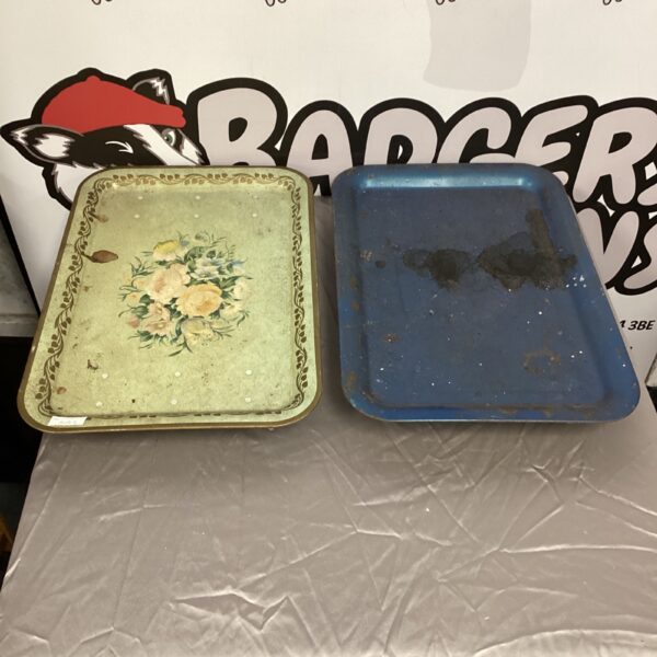 Vintage metal serving trays with floral design, collectible kitchenware.