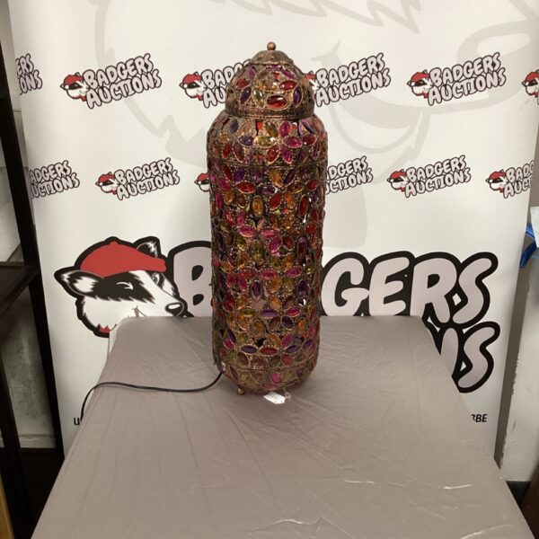Intricate mosaic design on a vintage Moroccan table lamp.