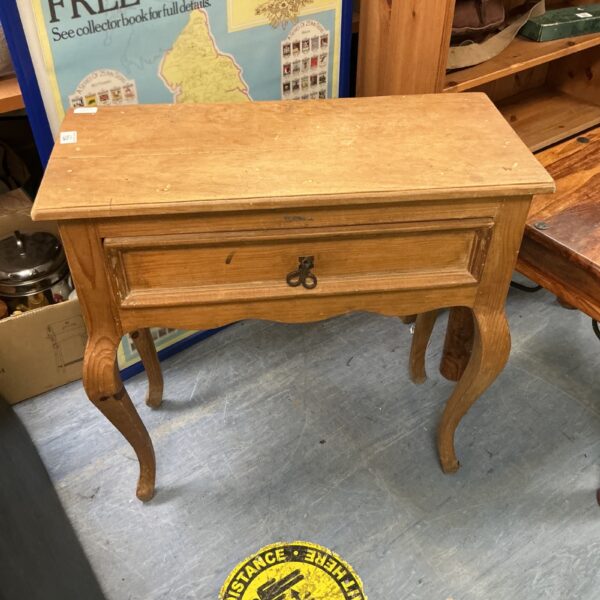Vintage oak side table with drawer and cabriole legs.