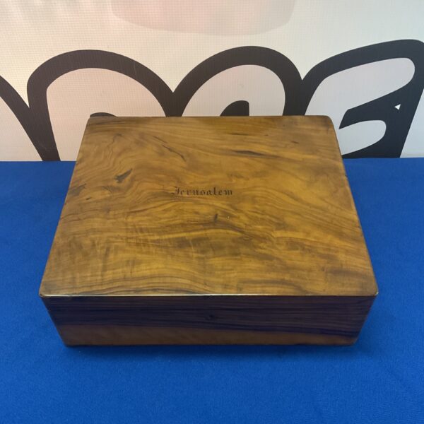 Vintage olive wood Jerusalem box with natural grain.