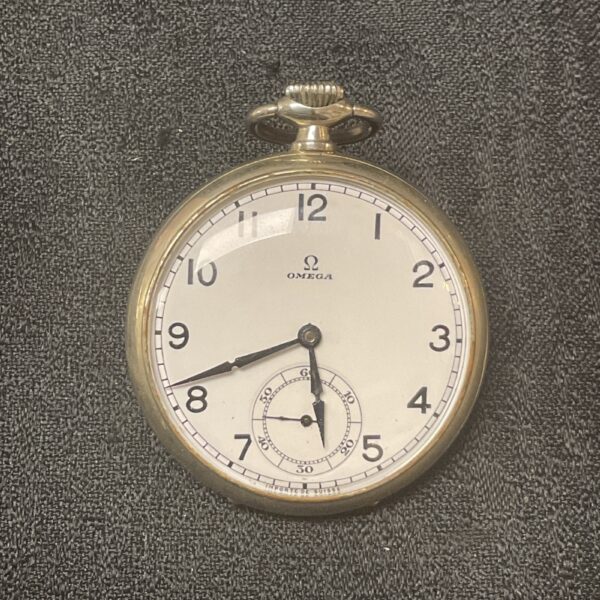Front view of a vintage Omega pocket watch with a white dial.