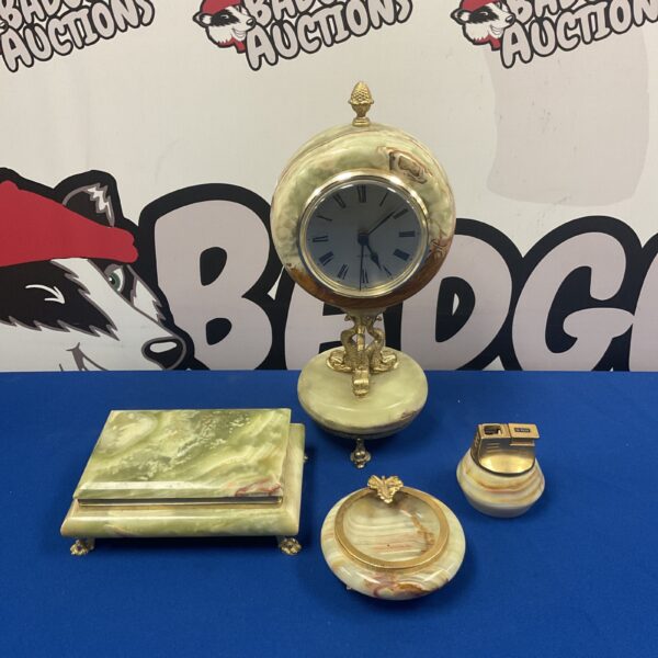 Vintage onyx mantle clock set with matching accessories.