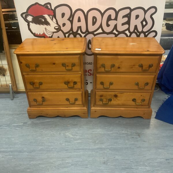Vintage pine chest of drawers, rustic bedroom storage solution.