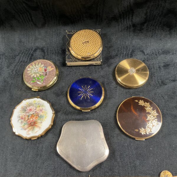 Vintage lot of seven ladies powder compacts, including Stratton and Margaret Rose.