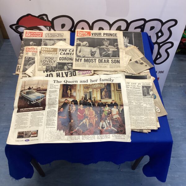 Vintage collection of newspapers relating to the British Royal Family.