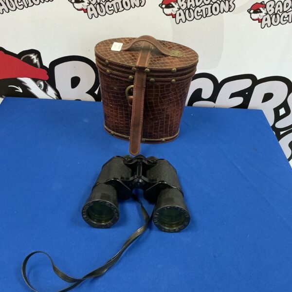 Vintage Tasco 16x50 binoculars with snake skin case.